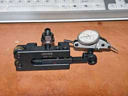 Metal tool holder with central hole and cylindrical shape.