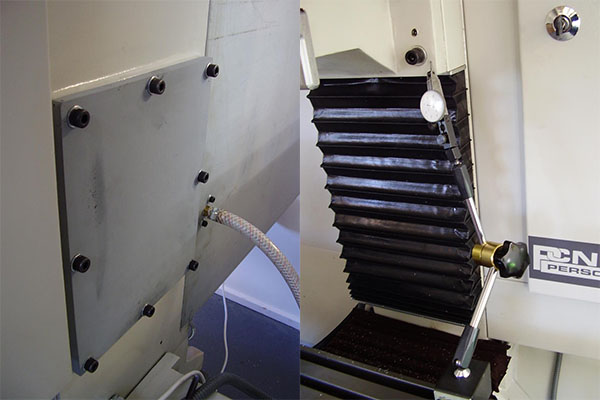 Close-up view of a Rigidity Plate's metal construction with bolts, slots, and holes.