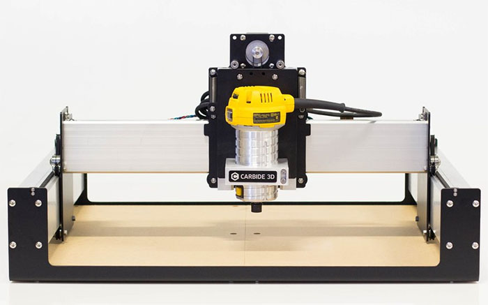 Shapeoko 1 precision cutting and engraving machine with flatbed surface and vertical column.