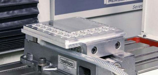 Tormach vacuum chuck with metal construction and logo.