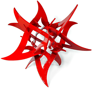 Red 3D star-shaped object with sharp points and curved edges.