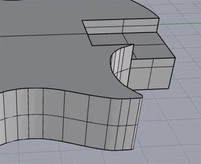 Gray wavy object with grid pattern on a light gray background.