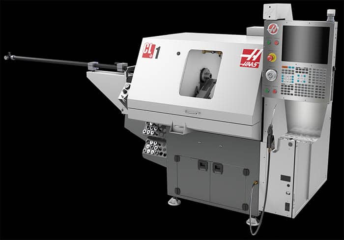 Large white Haas CL-1 vertical machining center with control panel, window, and "Haas" logo.