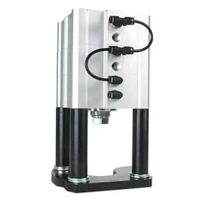 Silver metal device with black legs and cables.