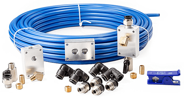 Blue hoses, metal fittings, and equipment displayed against a white background.