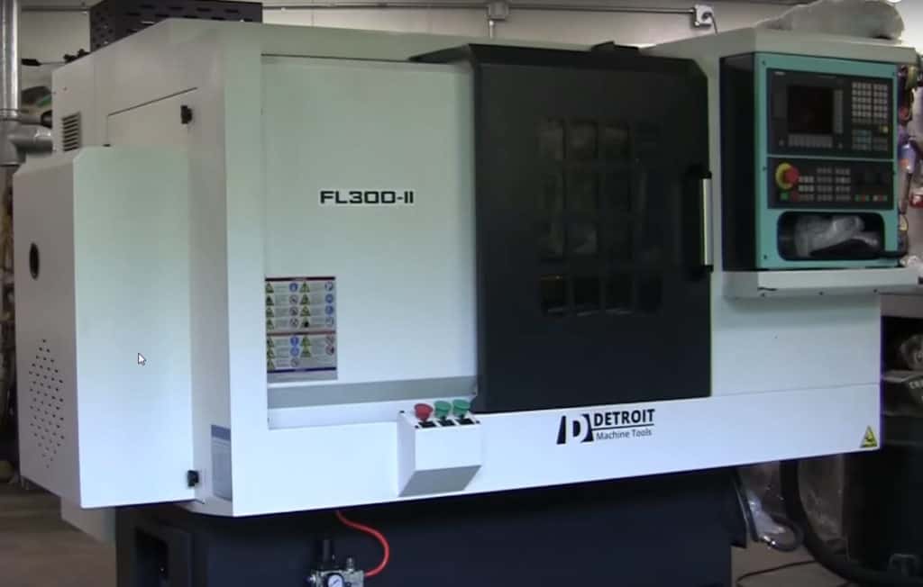 Large industrial lathe with DETROIT Machine Tools FL300-II label.