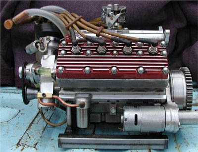 V8 flathead model engine with intricate details and mechanical components.
