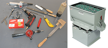 A collection of hand saws, files, sandpaper, and miscellaneous metalworking tools.