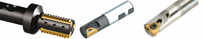 Cylindrical objects with various attachments on a white background, likely CNC machine tools or components.