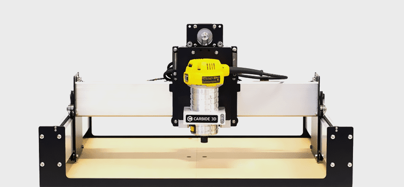 Black and yellow CNC router with "CARRIDE 3D" label on a white background.