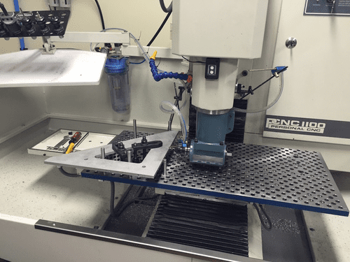 CNC machine in a workshop setting.