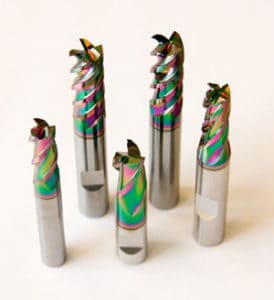 Four end mills with DLC coating, distinct cutting edges and a plain white background.