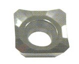 Square metal nut with oval cutout.