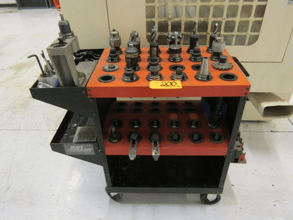 Industrial supply cart with tools and equipment, featuring a "200" sticker.