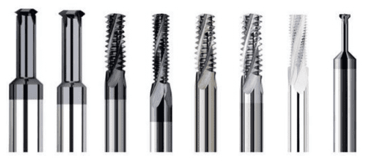 Metal cutting tools in various shapes and sizes.