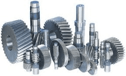 Collection of interlocking gears in various sizes and shapes.