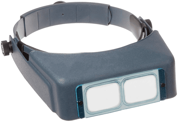 Gray headband with textured surface, adjustable knob, and attached rectangular plastic piece with clear panels.