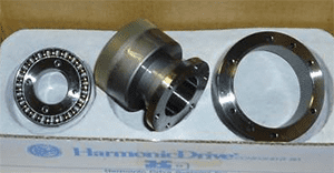 Metal parts on white cardboard box with blue text.