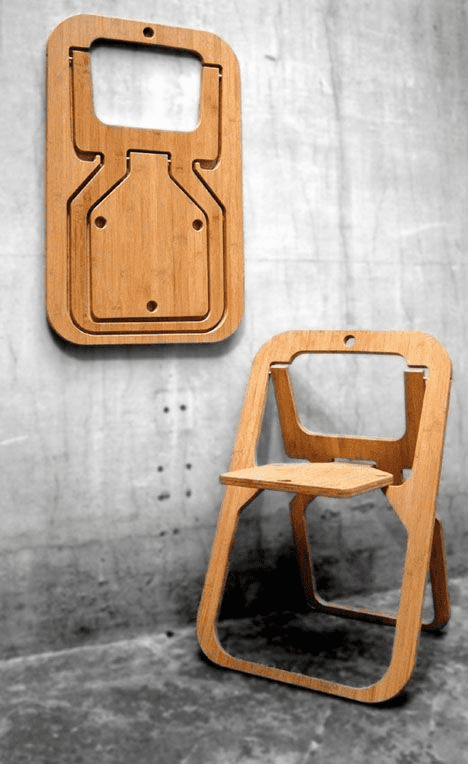 Unique wooden chair frame on gray background.