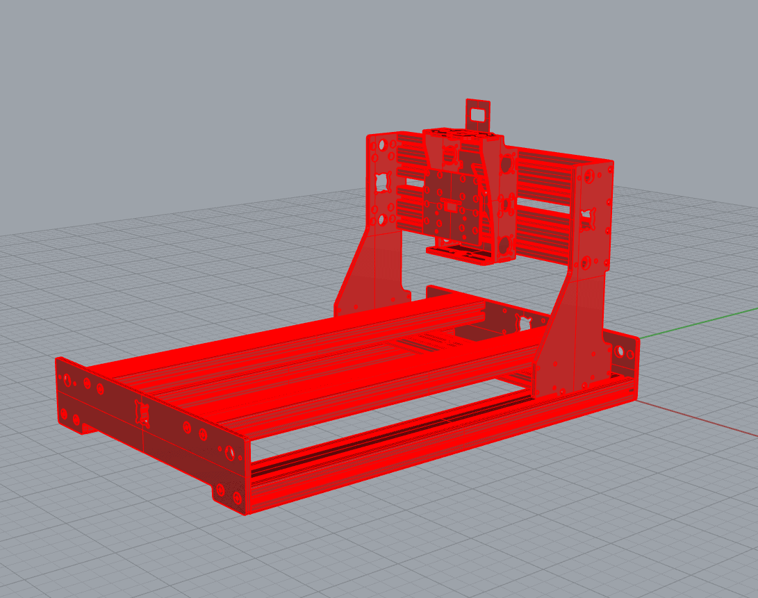 Red metal machine frame with rectangular base and vertical supports.