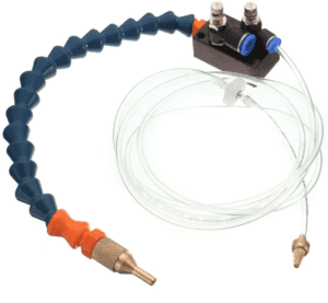 Flexible air tube with black and orange hose and clear tube attached to an airbrush.