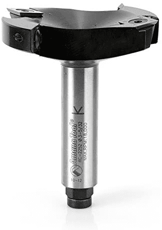A silver and black metal tool with engraved text, featuring a cylindrical body and flat top.