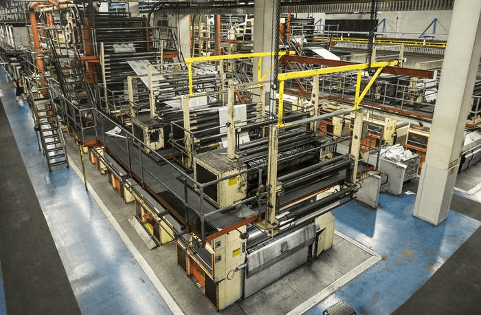 Industrial machinery on a concrete floor.