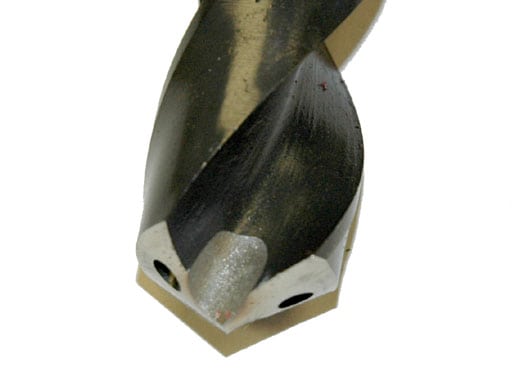 Pointed drill bit tip with central hole.