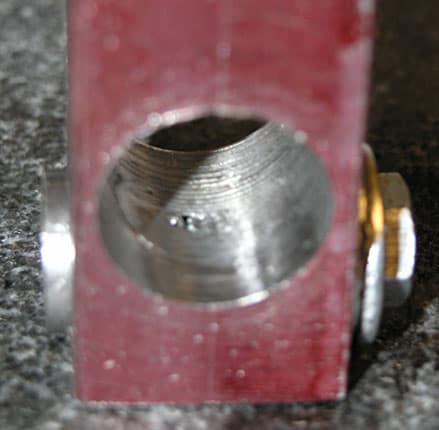 Metal object with central hole.