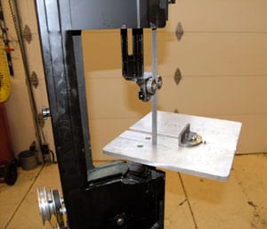 Bandsaw table with designed features.