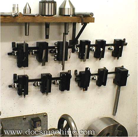 Metalworking tools mounted on a workshop wall.