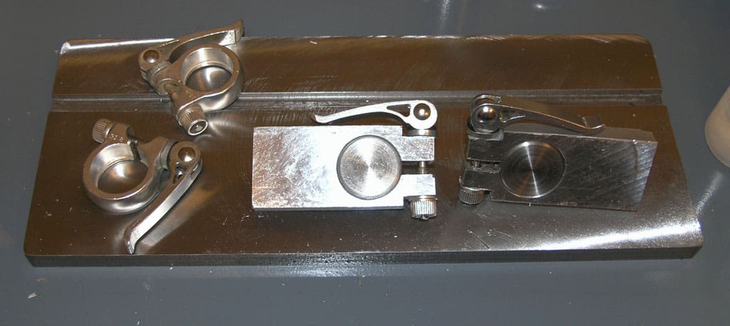 Metalworking vise with ball swivel, top and bottom views.