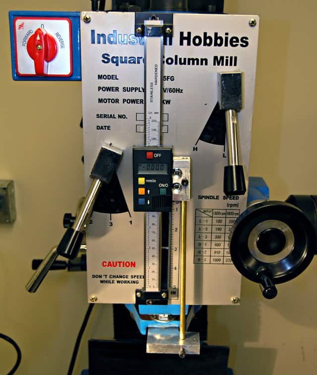 Square column mill with digital readout display and control equipment.