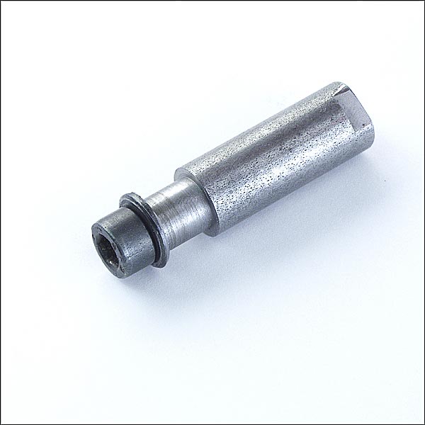 Silver metal cylindrical component with hollow interior and rounded ends.
