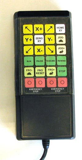 Industrial keyboard pendant with various control buttons and symbols.