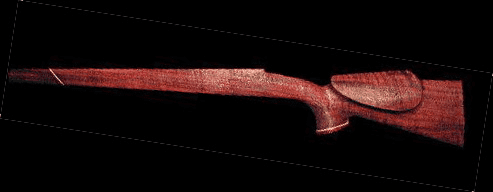 Red wooden gun stock on a black background.