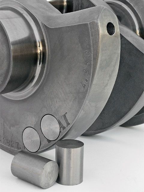 Crankshaft bearing cap and connecting rod bushings in machining context.
