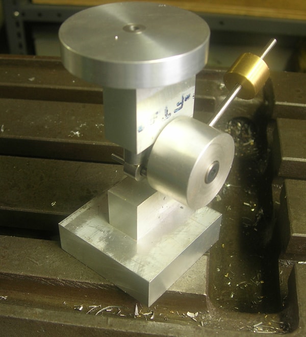 Sensitive drill table attachment for metal fabrication or machining.