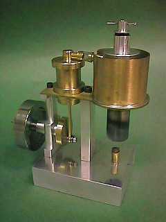 Vintage brass-handled tap wrench for metalworking.