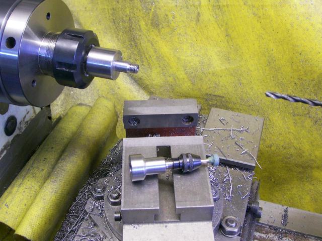 Metalworking lathe in operation, showcasing its precision and versatility.