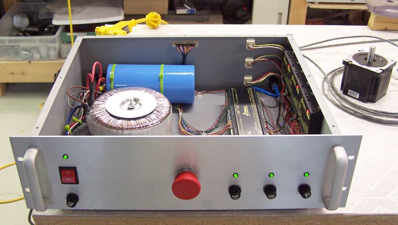 Custom-built power supply unit for a 3D printer or laser engraver with aluminum case and internal components.