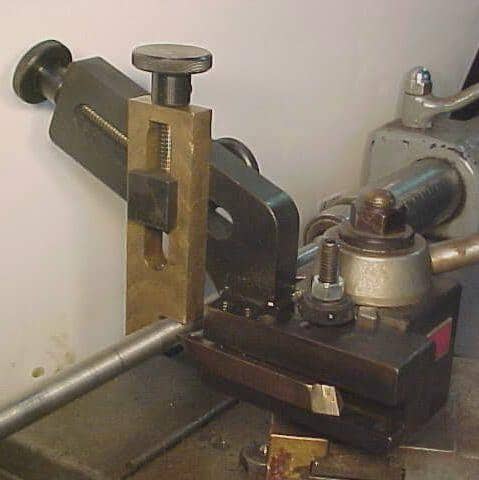Metalworking tool with screw and clamp.