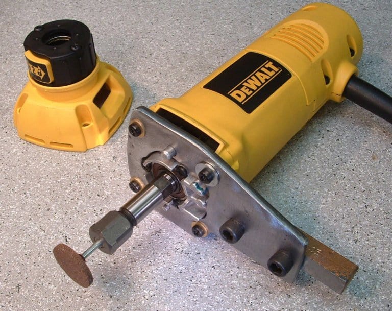 A yellow DeWalt power tool with black handle on a light background.