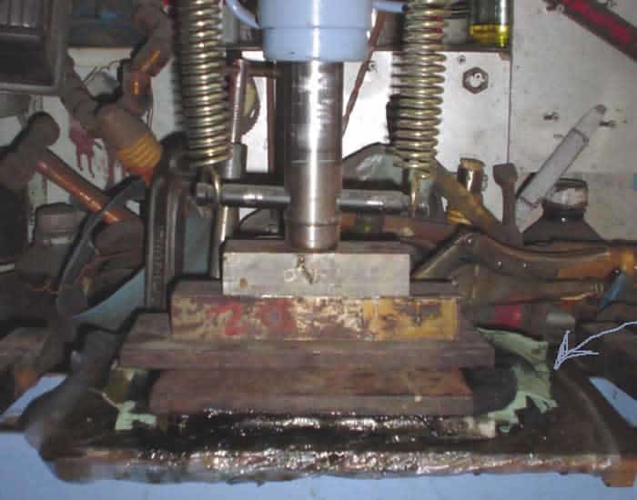 Industrial machinery in a workshop setting.