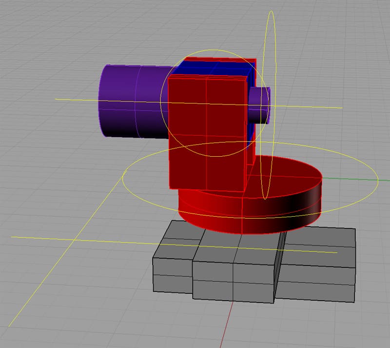 3D CAD rendering of mechanical components with cylinders, spheres, rectangles and various colored shapes.
