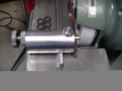 Metal component on machinery part.