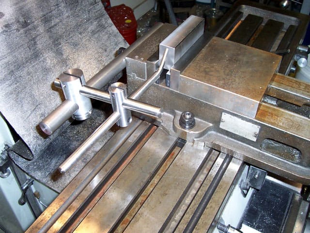 Metal vise with stop collar.