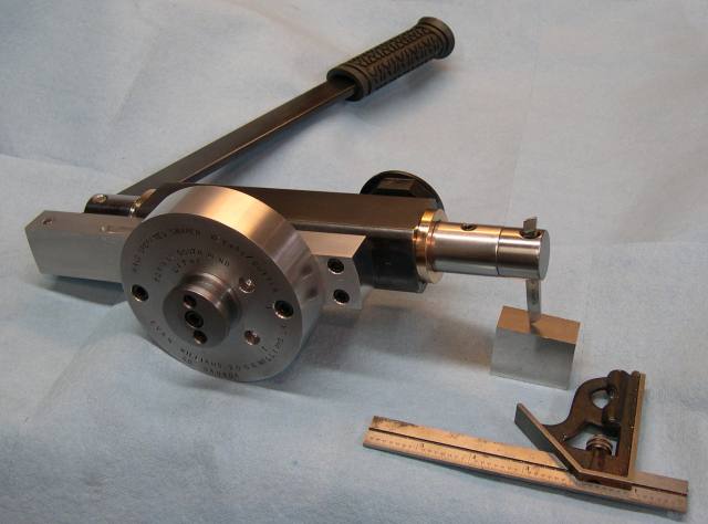 Metalworking tool, key slotter attachment for lathe, with components and features showcased.