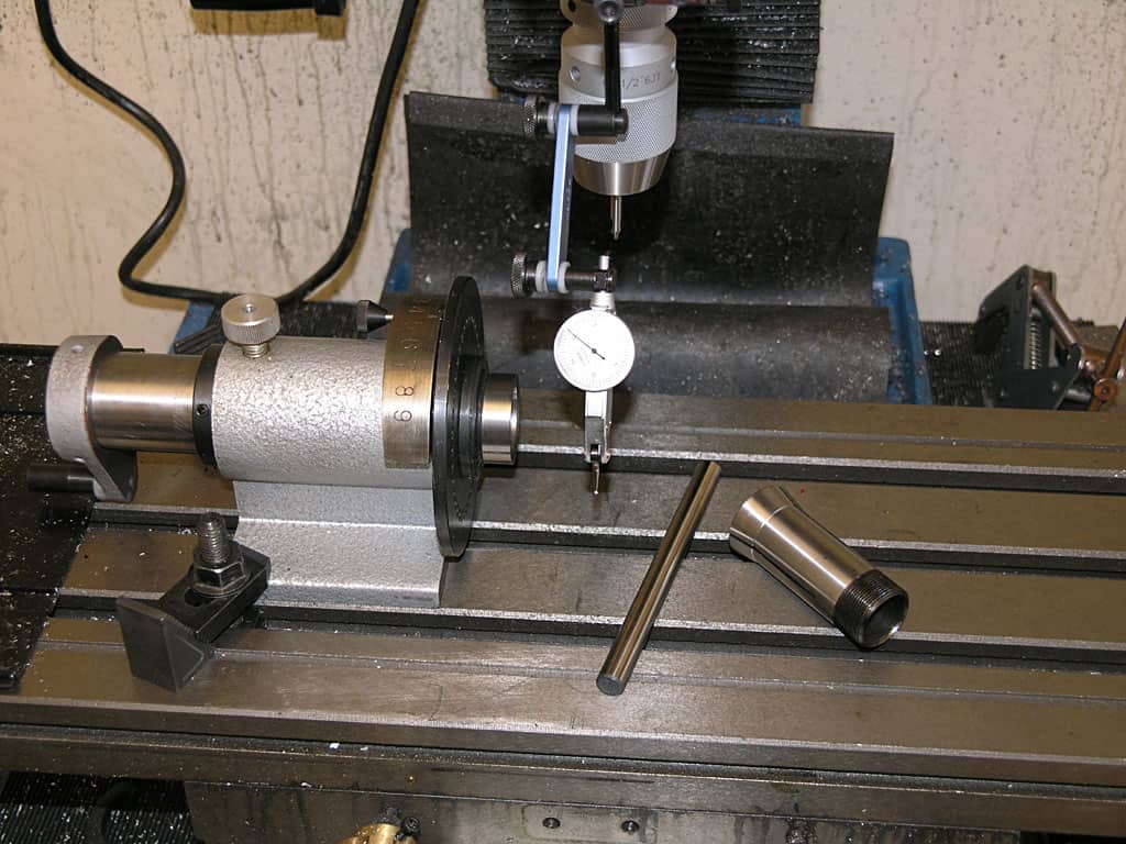 Metal working lathe with tools and precision measuring instruments.