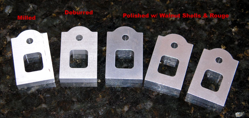 Metal parts with various finishes: milled, deburred, polished.